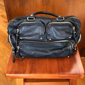 Kate Spade black tote handbag.